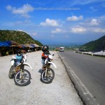 Vietnam Offroad's motorbike tours. Highway and roadside coffee shop.